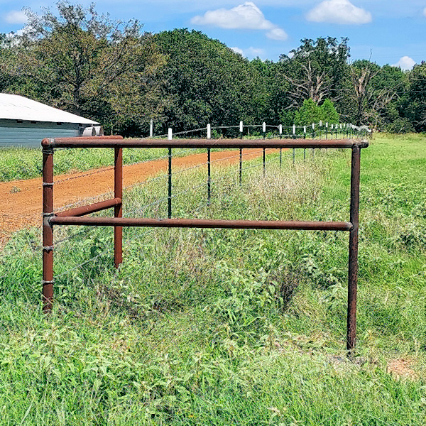 The H brace anchors the corner of a barbed wire fence.